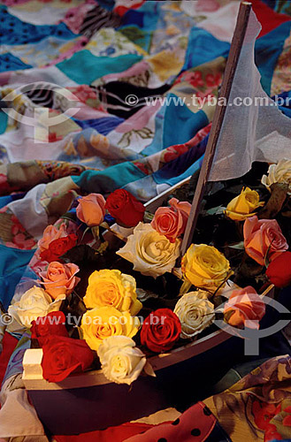  Boat with colored roses, offering to Iemanja in the night of the New Year`s Eve -  Rio de Janeiro city - Rio de Janeiro state - Brazil 