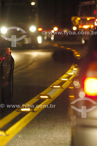  Cars at a road at night 