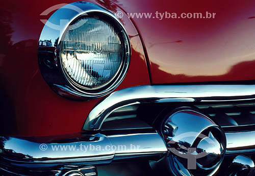  Detail of headlight on a vintage car 