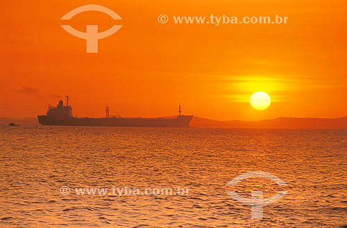  Cargo ship at sunset on the coast of Salvador city - Bahia state - Brazil 