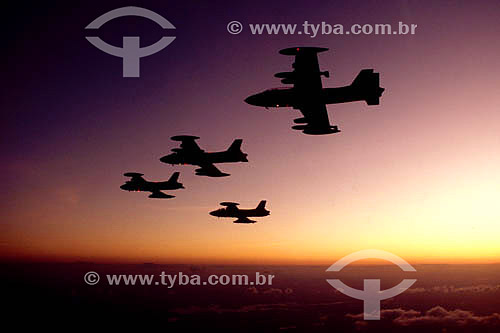  Silhouettes of airplanes at sunset 