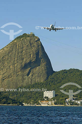  Airplane at Rio de Janeiro city sky with Sugar Loaf Mountain in the background - Rio de Janeiro state - Brazil 