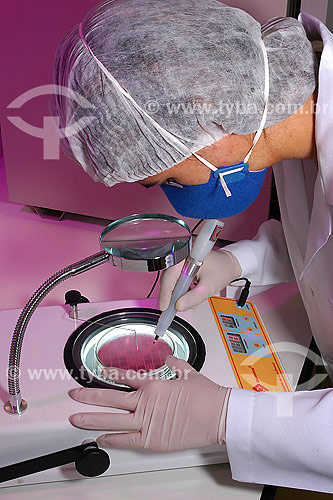  Woman at microbiology laboratory 