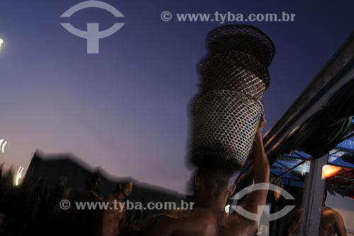  Subject: Man carrying acai - Ver-o-peso Market (See the Weight Market) / Place: Belem City - Para State - Brazil / Date: 10/13/2008 