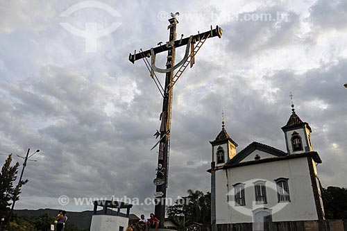  Subject: Matriz Church with a cross in front of it (biggest cross in Minas Gerais State) / Place: Sao Gonçalo do Rio Abaixo City - Minas Gerais State - Brazil / Date: April 2009 