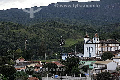  Subject: Matriz Church with a cross in front of it (biggest cross in Minas Gerais State) / Place: Sao Gonçalo do Rio Abaixo City - Minas Gerais State - Brazil / Date: April 2009 
