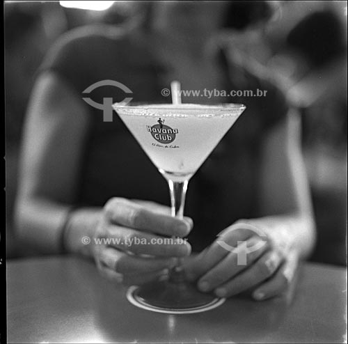  Subject: Woman with a cup of dayquiri  drink at La Floridita Bar Restaurant /   Local:   Havana - Cuba  / Date: october 2009 