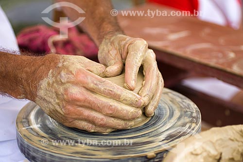  Subject: Hands of a potter working at the wheel / Place: Florianopolis - Santa Catarina state - Brazil / Date: 03/2010 