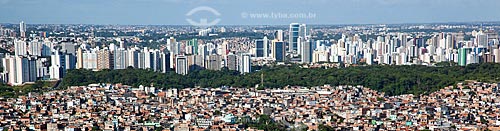  Subject: Aerial view of a slum in Salvador city with buildings in the background  / Place:  Salvador city - Bahia state - Brazil  / Date: 01/2011 