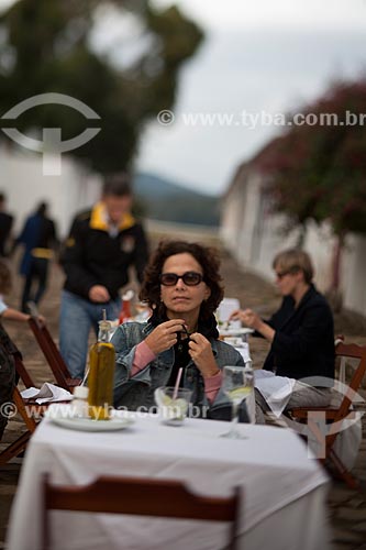  Subject: Tourist in bar table / Place: Paraty city - Rio de Janeiro state (RJ) - Brazil / Date: 07/2011 