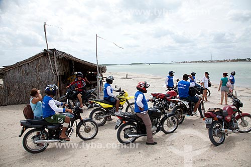  Subject: Motorcyclists awaiting ferry to cross Coreaú River / Place: Camocim city - Ceara state (CE) - Brazil / Date: 11/2011 