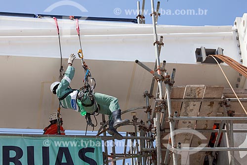  Reform Journalist Mario Filho Stadium - also known as Maracana - worker fixes the warning sign on the hoisting cables that will support the roof of the stadium   - Rio de Janeiro city - Rio de Janeiro state (RJ) - Brazil