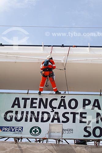  Reform Journalist Mario Filho Stadium - also known as Maracana - worker fixes the warning sign on the hoisting cables that will support the roof of the stadium   - Rio de Janeiro city - Rio de Janeiro state (RJ) - Brazil