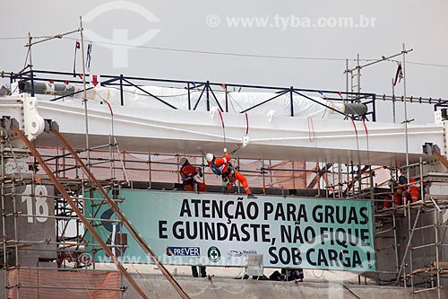  Reform Journalist Mario Filho Stadium - also known as Maracana - worker fixes the warning sign on the hoisting cables that will support the roof of the stadium   - Rio de Janeiro city - Rio de Janeiro state (RJ) - Brazil