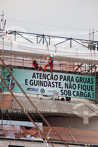  Reform Journalist Mario Filho Stadium - also known as Maracana - worker fixes the warning sign on the hoisting cables that will support the roof of the stadium   - Rio de Janeiro city - Rio de Janeiro state (RJ) - Brazil