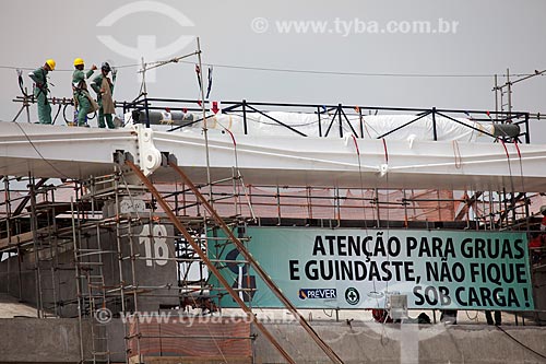  Reform Journalist Mario Filho Stadium - also known as Maracana - worker fixes the warning sign on the hoisting cables that will support the roof of the stadium   - Rio de Janeiro city - Rio de Janeiro state (RJ) - Brazil