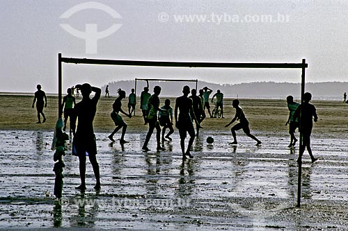  Subject: Men Playing football on the beach / Place: Sao Luis city - Maranhao state (MA) - Brazil / Date: 2000 