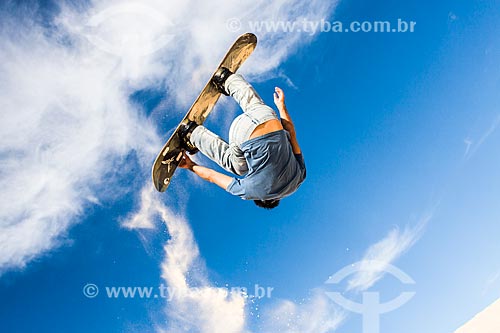  Man practicing sandboarding in the dunes of Joaquina Beach  - Florianopolis city - Brazil