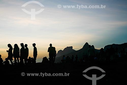  Dusk in stone of Arpoador with Two Brothers Mountain and Rock of Gavea in the background  - Rio de Janeiro city - Rio de Janeiro state (RJ) - Brazil