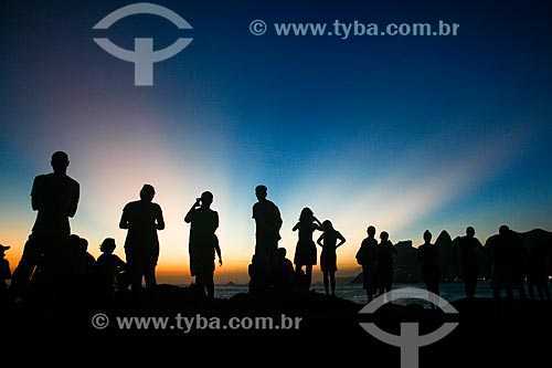  Dusk in stone of Arpoador with Two Brothers Mountain and Rock of Gavea in the background  - Rio de Janeiro city - Rio de Janeiro state (RJ) - Brazil