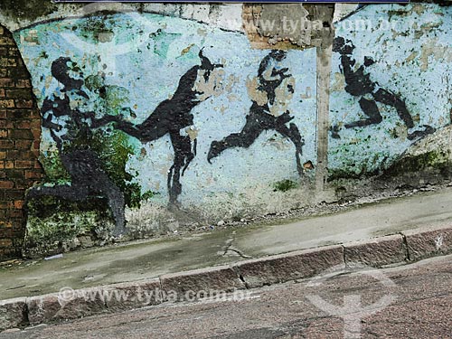  Subject: Wall with graffiti of men running / Place: Porto Alegre city - Rio Grande do Sul state (RS) - Brazil / Date: 05/2014 