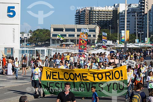  Religious manifestation - Copacabana Beach - Post 5 - with temporary television studios installed during the World Cup in Brazil in the background  - Rio de Janeiro city - Rio de Janeiro state (RJ) - Brazil