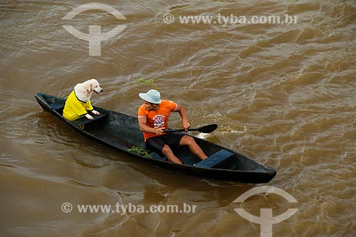  Man in canoe on the Amazon River  - Urucara city - Amazonas state (AM) - Brazil