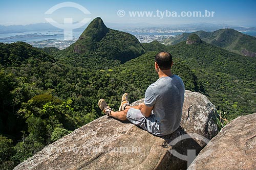  Man observing the landscape from Bico do Papagaio Mountain  - Rio de Janeiro city - Rio de Janeiro state (RJ) - Brazil