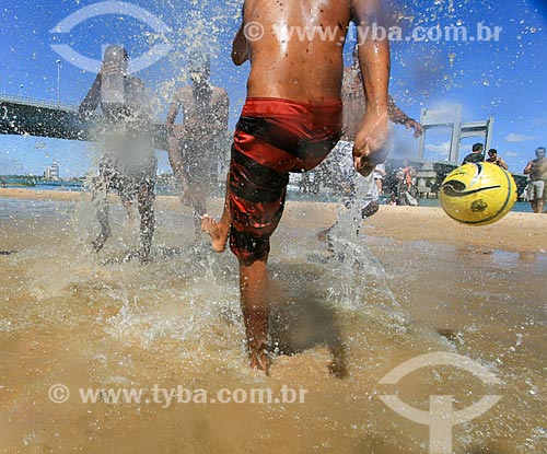  Youngs playing soccer on the banks of Sao Francisco River  - Juazeiro city - Bahia state (BA) - Brazil