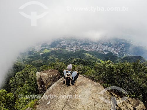  Man observing the view of Tijuca National Park from Bico do Papagaio Mountain  - Rio de Janeiro city - Rio de Janeiro state (RJ) - Brazil