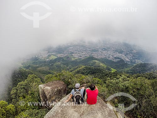  Men observing the view of Tijuca National Park from Bico do Papagaio Mountain  - Rio de Janeiro city - Rio de Janeiro state (RJ) - Brazil