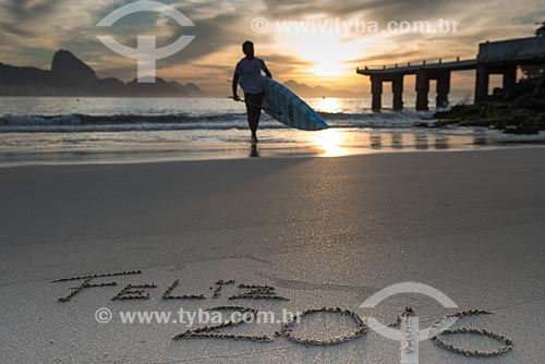  Sand that says: Happy 2016 - post 6 of Copacabana Beach with the Sugar Loaf in the background  - Rio de Janeiro city - Rio de Janeiro state (RJ) - Brazil