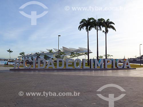  Placard that says #CidadeOlimpica - Maua Square with the Amanha Museum (Museum of Tomorrow) in the background  - Rio de Janeiro city - Rio de Janeiro state (RJ) - Brazil