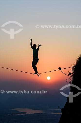  Practitioner of slackline o the top of Rock of Gavea  - Rio de Janeiro city - Rio de Janeiro state (RJ) - Brazil