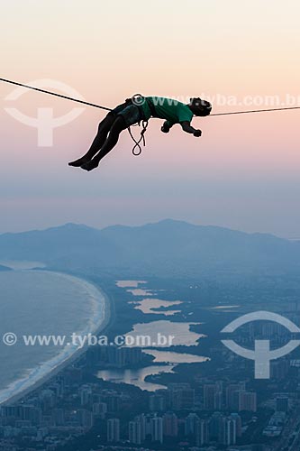  Practitioner of slackline o the top of Rock of Gavea - Barra da Tijuca in the background  - Rio de Janeiro city - Rio de Janeiro state (RJ) - Brazil