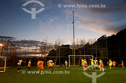  Children playing soccer - Vidigal Olympic Village with the Rock of Gavea in the background  - Rio de Janeiro city - Rio de Janeiro state (RJ) - Brazil