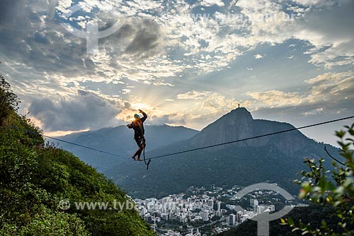  Practitioner of slackline - Cabritos Mountain (Kid Goat Mountain) - with the Christ the Redeemer in the background  - Rio de Janeiro city - Rio de Janeiro state (RJ) - Brazil