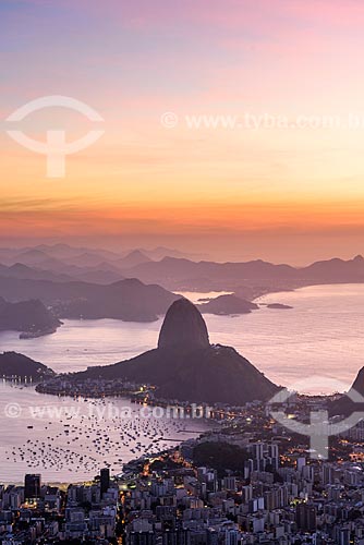  View of Botafogo neighborhood from mirante of the Christ the Redeemer with Sugar Loaf in the background during dawn  - Rio de Janeiro city - Rio de Janeiro state (RJ) - Brazil