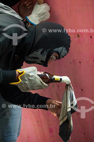  Demonstrator lighting Molotov cocktail during Protest of public servers  - Rio de Janeiro city - Rio de Janeiro state (RJ) - Brazil