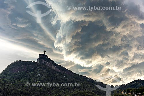  View of Christ the Redeemer from Cosme Velho neighborhood during the sunset  - Rio de Janeiro city - Rio de Janeiro state (RJ) - Brazil