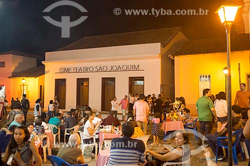  Bar tables on street - Goias city with the Cine Sao Joaquim (1857) in the background  - Goias city - Goias state (GO) - Brazil