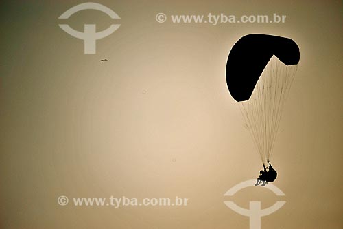  Silhouette of paraglider tandem flight  - Rio de Janeiro city - Rio de Janeiro state (RJ) - Brazil