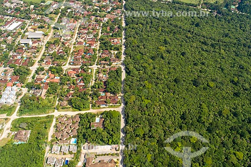  Picture taken with drone of the between inhabited and preserved area - Barra of Una neighborhood  - Sao Sebastiao city - Sao Paulo state (SP) - Brazil