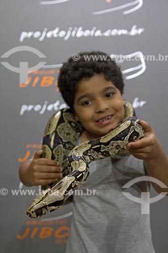  Boy holding Boa constrictor - Jiboia Project  - Bonito city - Mato Grosso do Sul state (MS) - Brazil