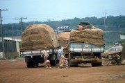 Trucks stopped on dirt road - The 80s - Ji-Parana city - Rondonia state (RO) - Brazil