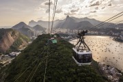 Cable car making the crossing between the Urca Mountain and Sugarloaf during the sunset - Rio de Janeiro city - Rio de Janeiro state (RJ) - Brazil