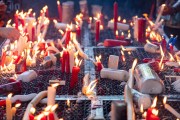 Faithful lighting candles - Church of the Martyrs Sao Gonçalo Garcia and Sao Jorge, better known as the Church of Sao Jorge - Located on the corner of Alfandega Street and Republica Square - Rio de Janeiro city - Rio de Janeiro state (RJ) - Brazil