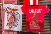 Cacique de Ramos T-shirt and T-shirt in honor of Saint George for sale next the Church of the Martyrs Sao Gonçalo Garcia and Sao Jorge, better known as the Church of Sao Jorge - Located on the corner of Alfandega Street and Republica Square - Rio de Janeiro city - Rio de Janeiro state (RJ) - Brazil