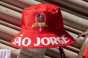 Red hat in honor of Saint George for sale next the Church of the Martyrs Sao Gonçalo Garcia and Sao Jorge, better known as the Church of Sao Jorge - Located on the corner of Alfandega Street and Republica Square - Rio de Janeiro city - Rio de Janeiro state (RJ) - Brazil