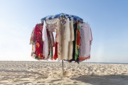 Improvised sun umbrella as a display for selling dresses on Copacabana Beach - Rio de Janeiro city - Rio de Janeiro state (RJ) - Brazil